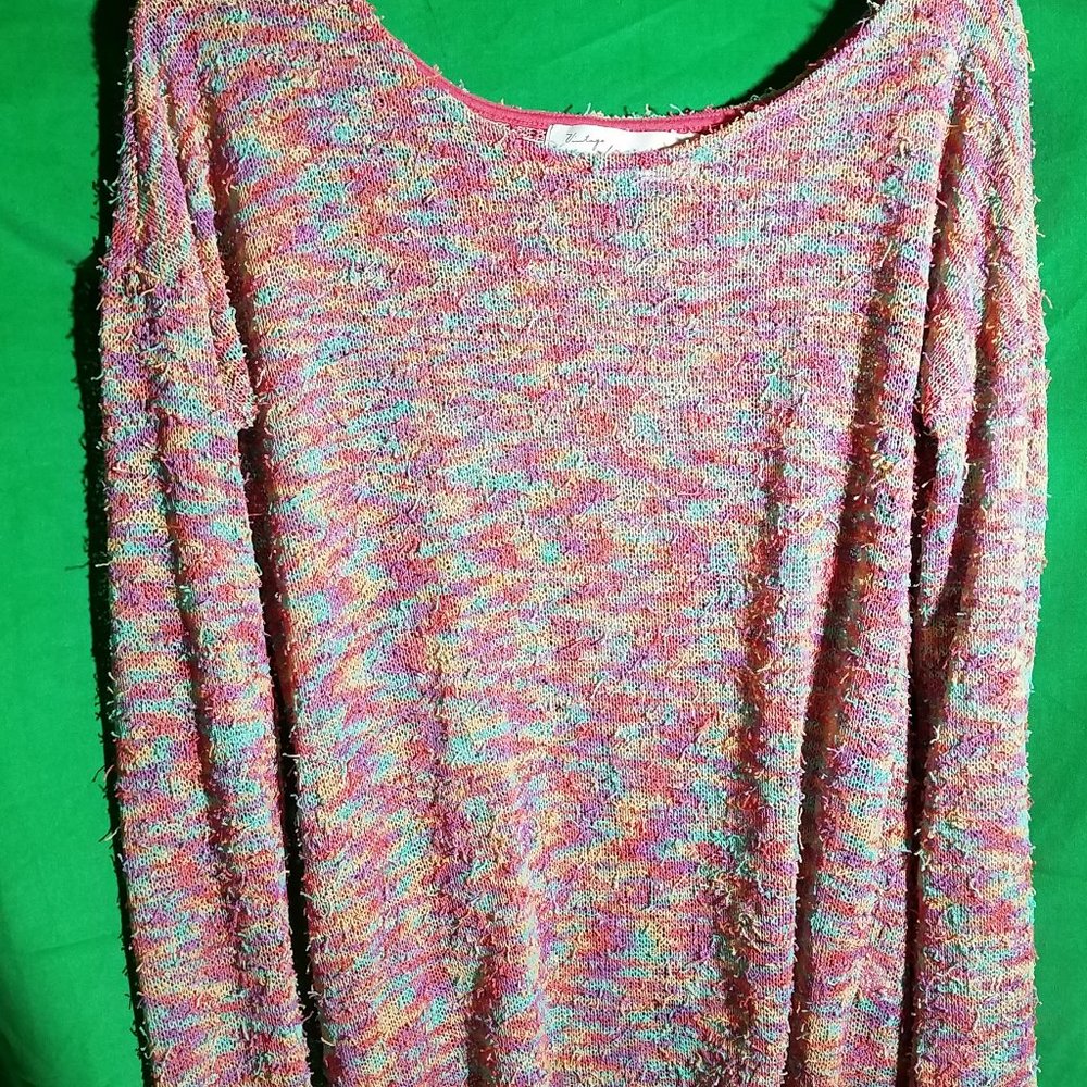 Light weight sweater with slit in back